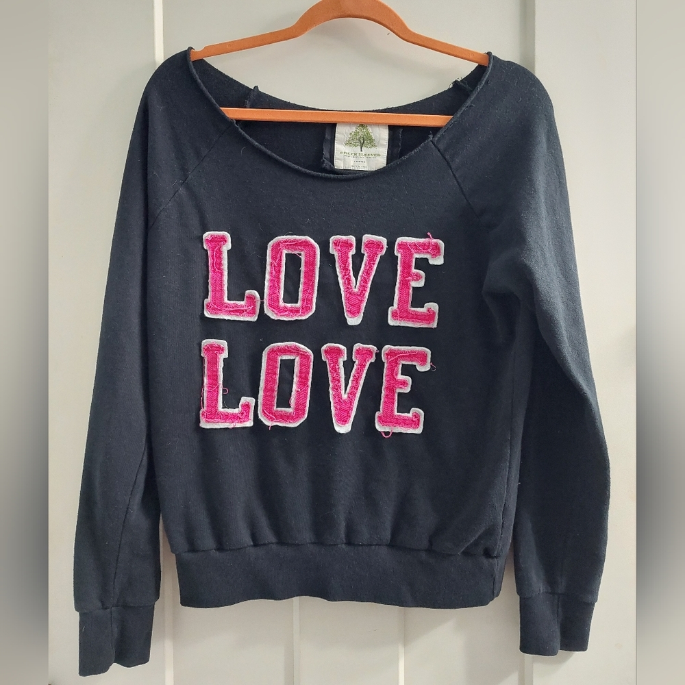 LOVE LOVE sweatshirt over the shoulder